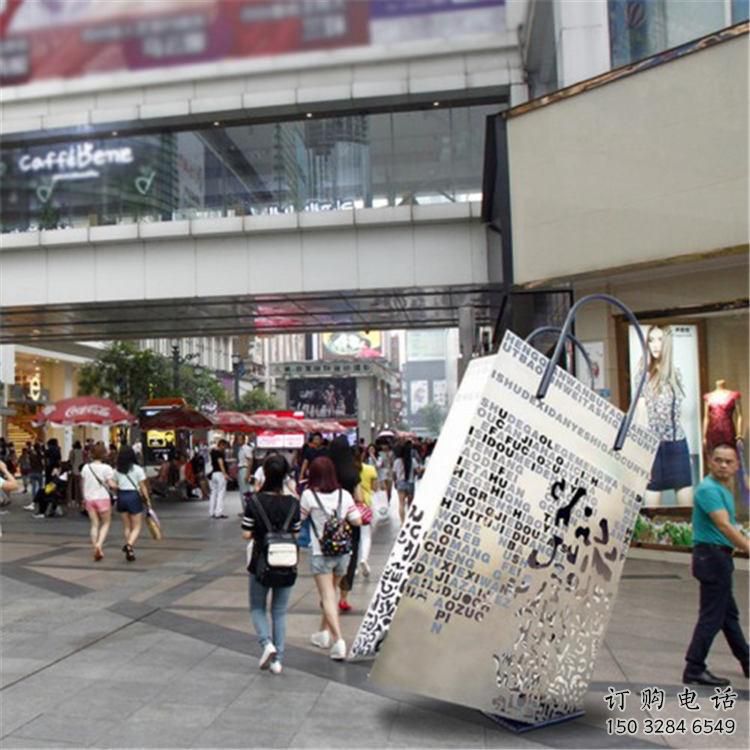 街頭提包雕塑廠家 大型別墅區(qū)擺件 現(xiàn)代不銹鋼提包雕塑生產(chǎn)