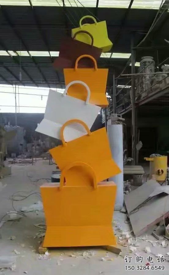 園林提包雕塑廠家 烤漆小品 中式不銹鋼提包雕塑制作 園林提包雕塑廠家 烤漆小品 中式不銹鋼提包雕塑制作