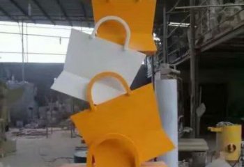 現(xiàn)代手提包雕塑廠家 大型別墅區(qū)擺件 烤漆手提包雕塑生產