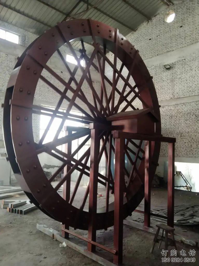 房地產(chǎn)水車(chē)雕塑廠家 鏤空創(chuàng)意擺件 現(xiàn)代不銹鋼水車(chē)雕塑加工廠