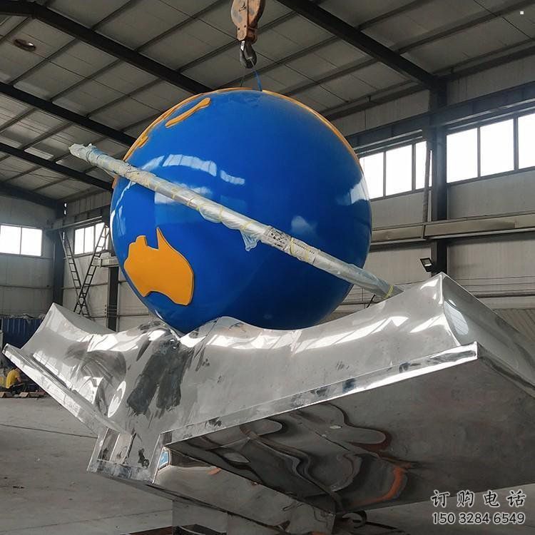 地球儀雕塑選用，小區(qū)擺件，大型書籍地球儀雕塑廠家