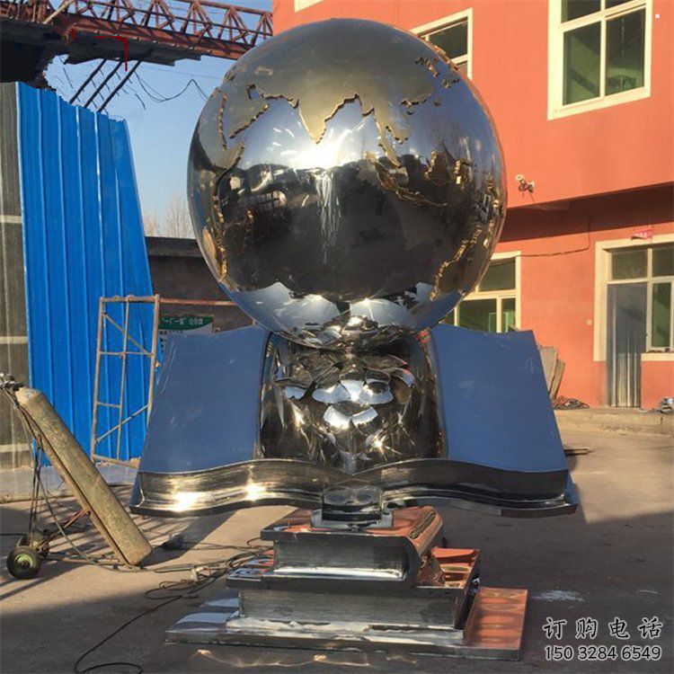 地球儀雕塑預(yù)定，城區(qū)小品，不銹鋼書籍地球儀雕塑制造商