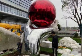 手托圓球雕塑指用，景觀概念，不銹鋼手托圓球雕塑廠家
