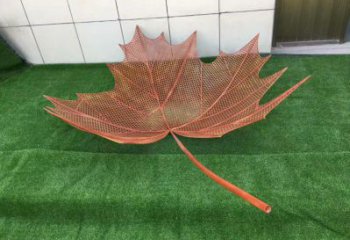 鏤空樹葉雕塑，景區(qū)雕塑，鐵藝樹葉雕塑廠家指用