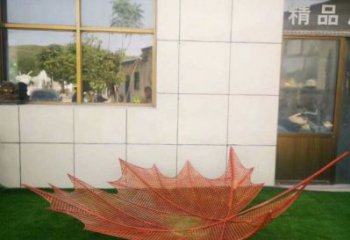 鏤空樹葉雕塑制造，藝術(shù)擺件，鐵藝樹葉雕塑訂做廠家
