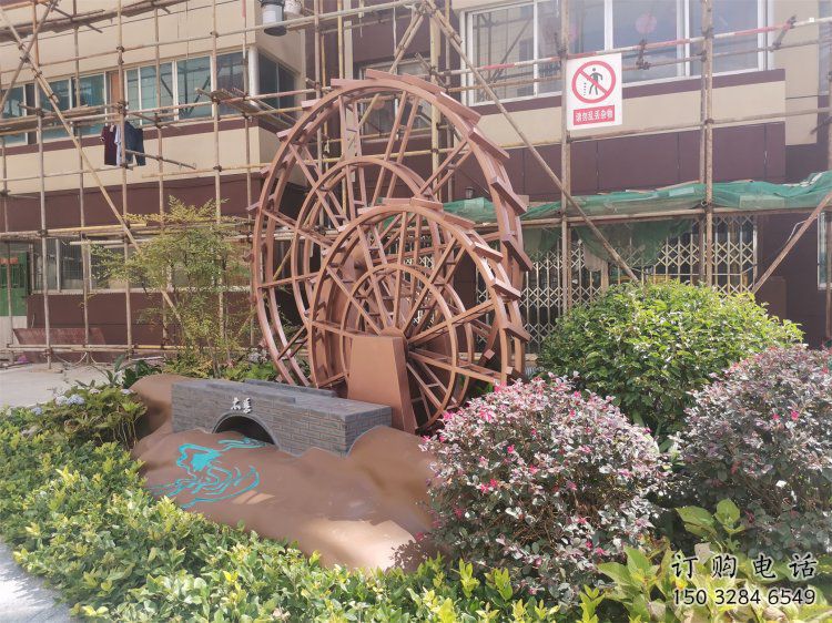 景觀水車雕塑供需，彩鋼制作，大型水車雕塑公司